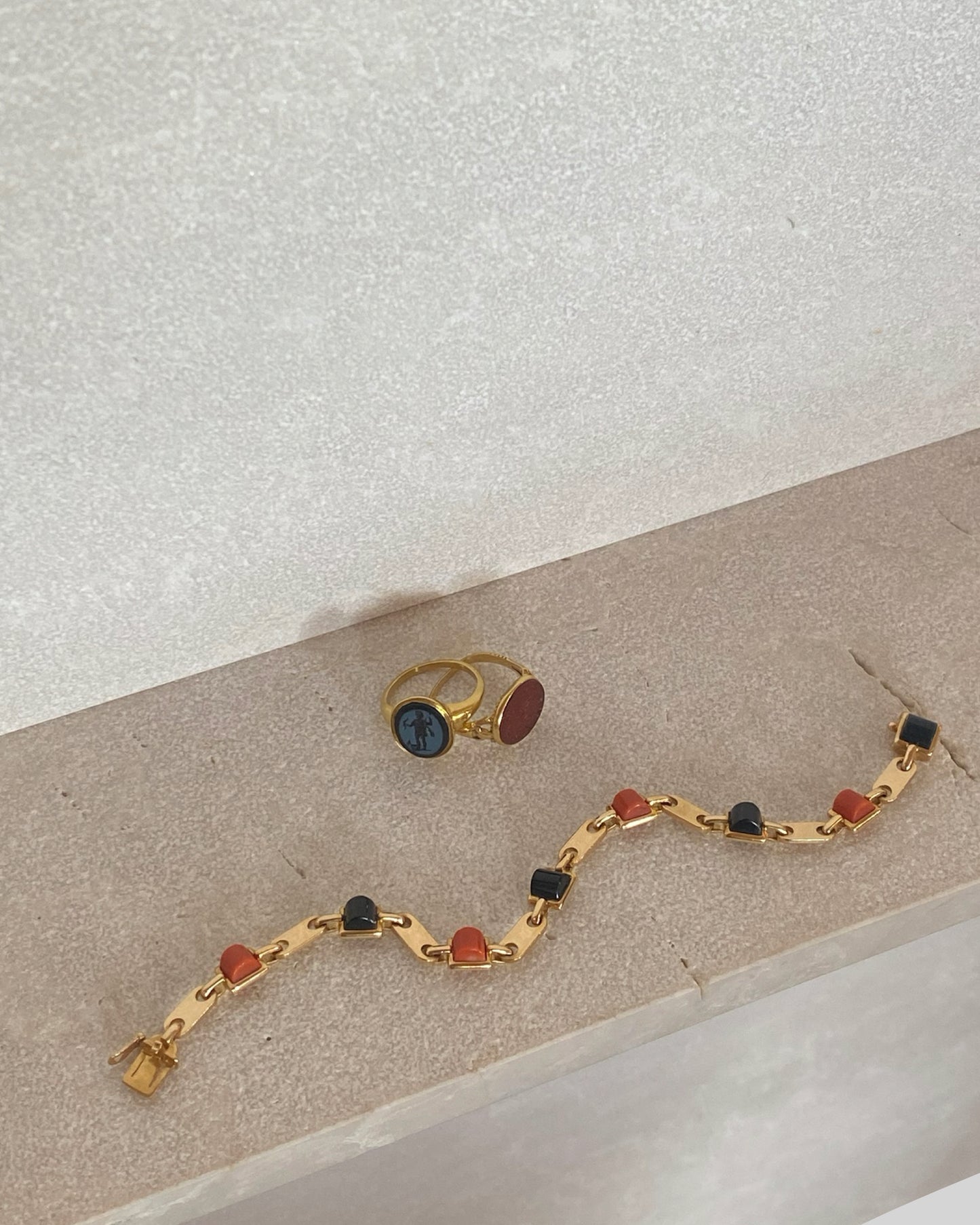 CARTIER GOLD, CORAL & ONYX LINKS BRACELET, 1970s