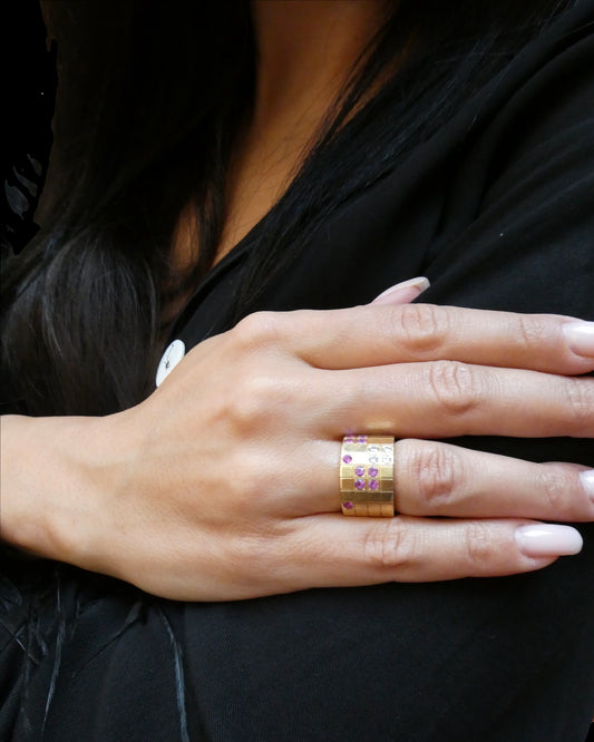 CARTIER DIAMONDS, PINK SAPPHIRES & YELLOW GOLD RING, 1980s