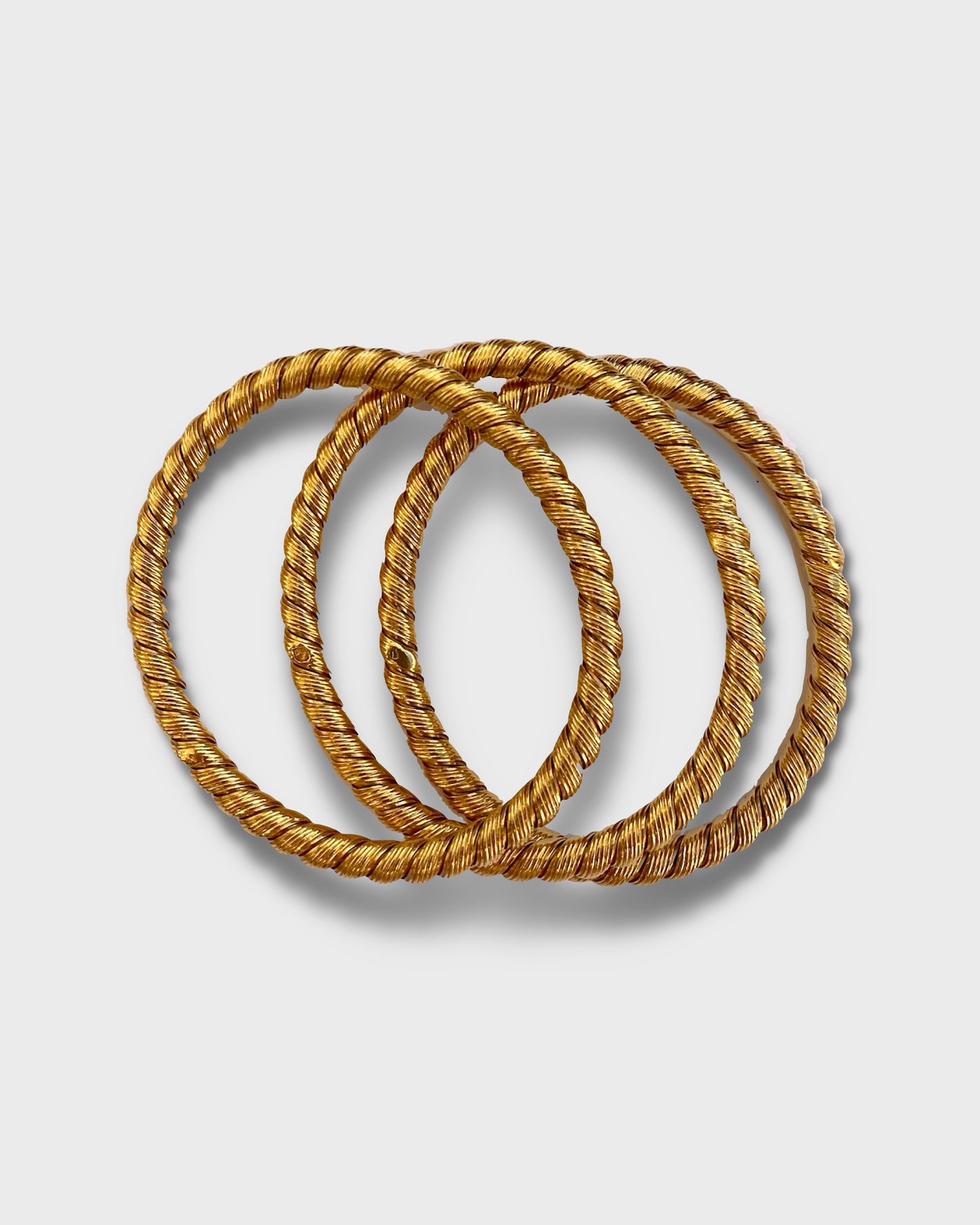 THREE VAN CLEEF & ARPELS YELLOW GOLD BRACELETS