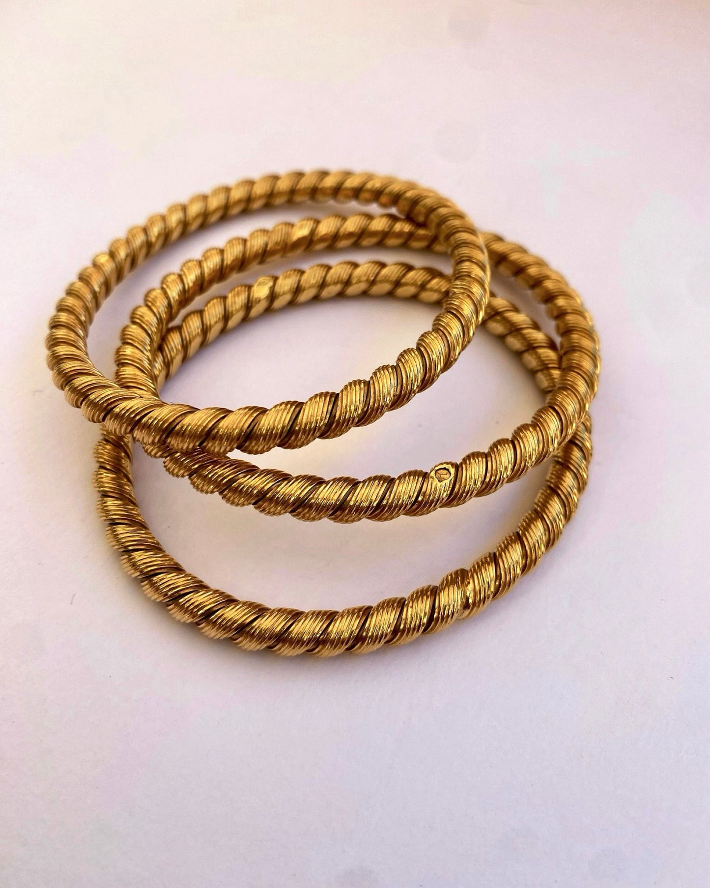 THREE VAN CLEEF & ARPELS YELLOW GOLD BRACELETS