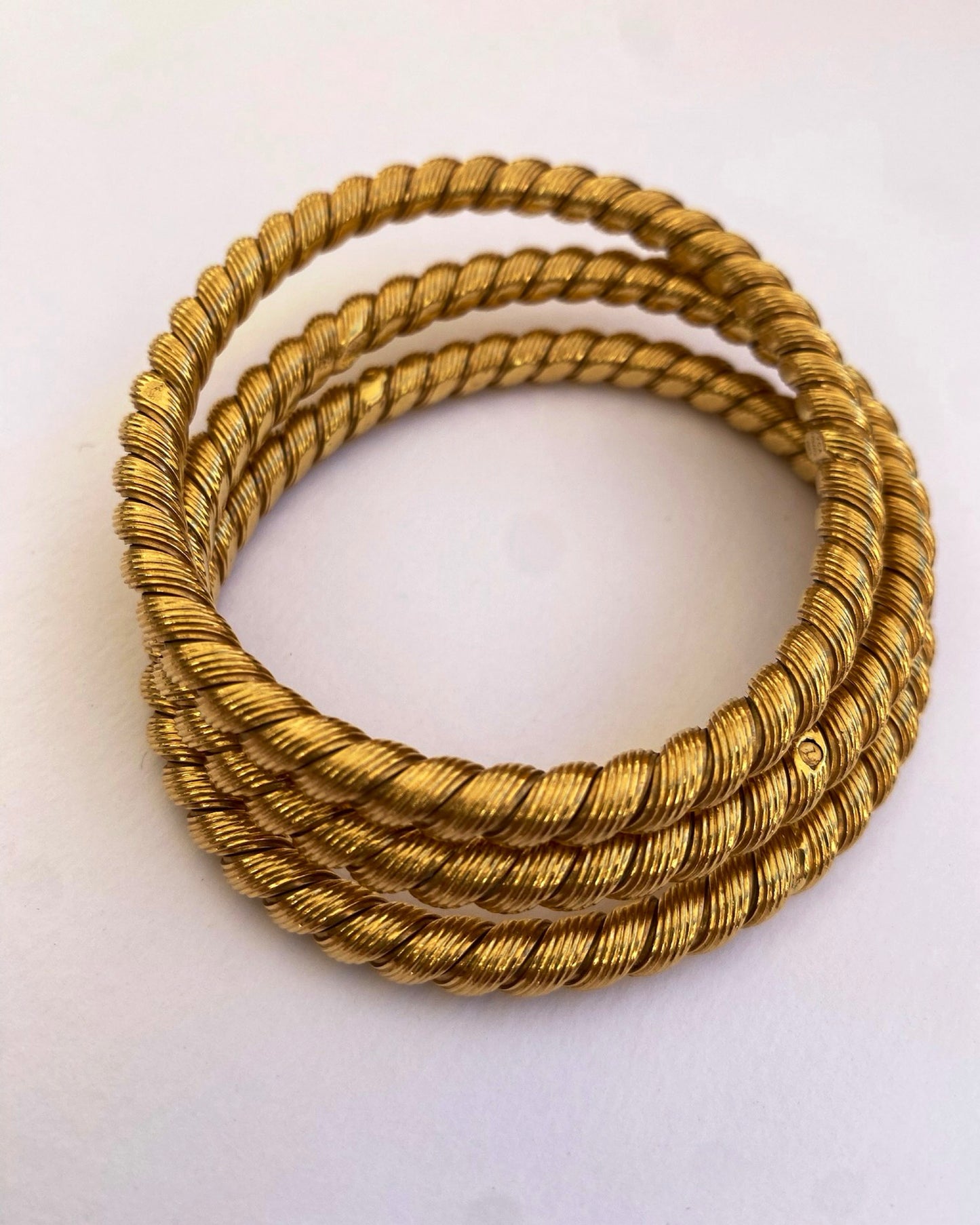 THREE VAN CLEEF & ARPELS YELLOW GOLD BRACELETS