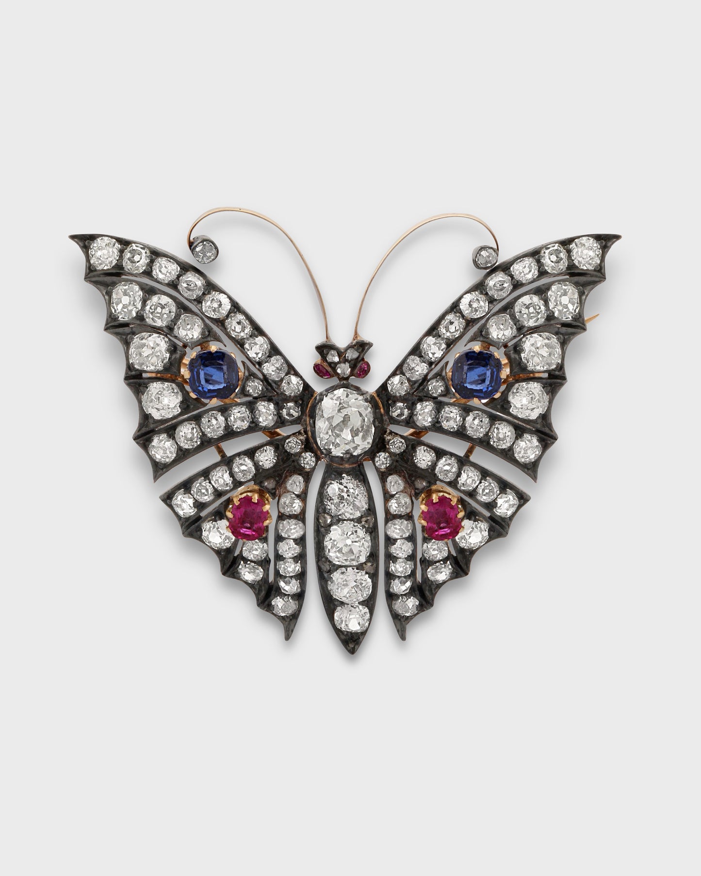 RUBIES, SAPPHIRES, DIAMONDS, SILVER & GOLD BUTTERFLY BROOCH, 1890s