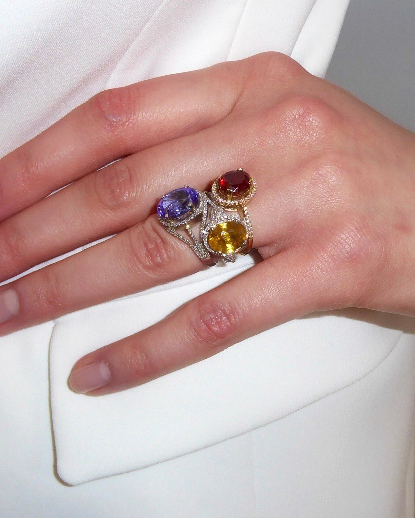 TRIO OF COLOURED GEMSTONES, DIAMONDS & YELLOW GOLD RINGS