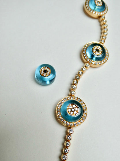 LORRAINE SCHWARTZ 'AGAINST EVIL EYE FIVE EYE' ROSE GOLD, DIAMOND & TOPAZ BRACELET, 21st CENTURY