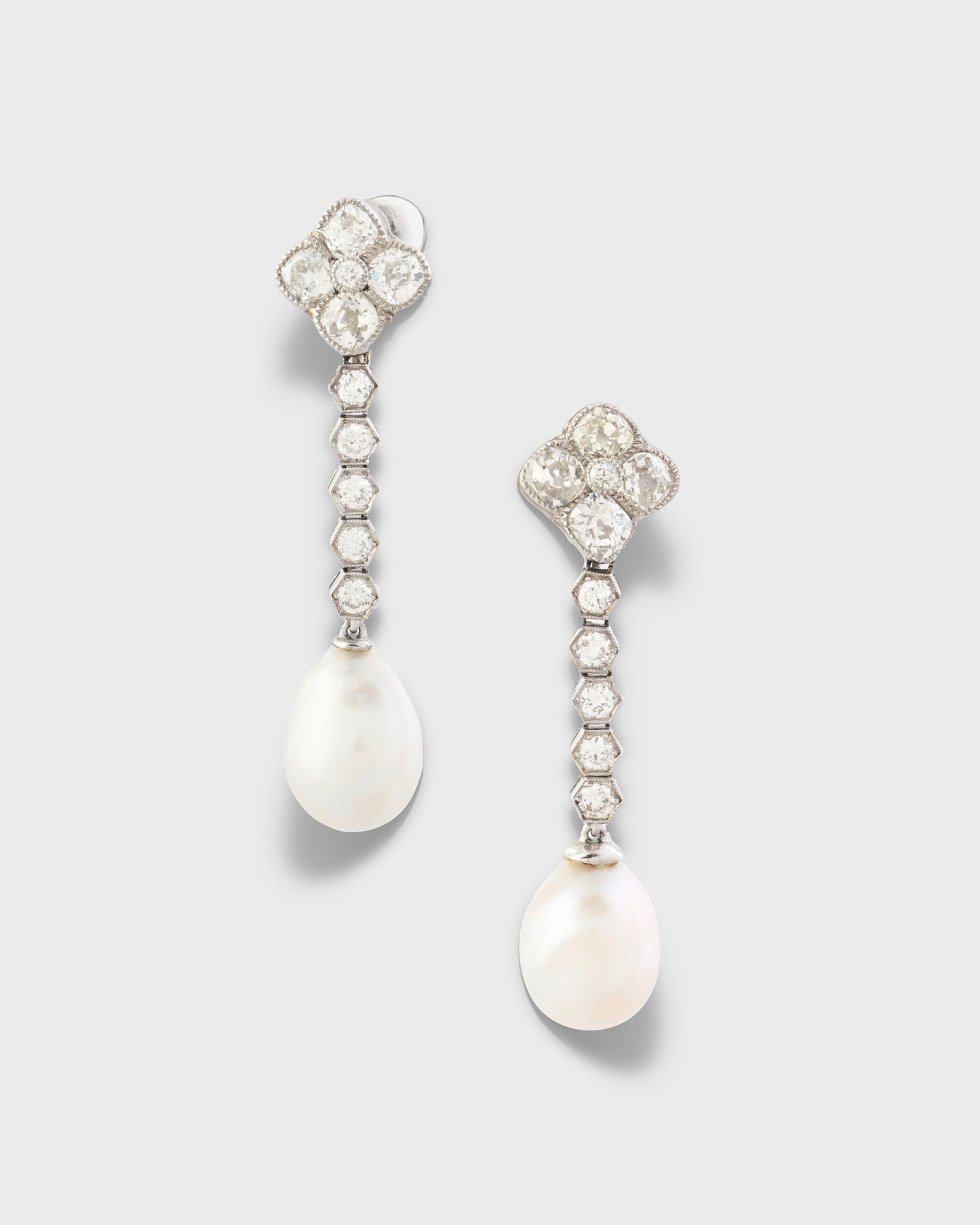 DIAMOND, NATURAL PEARL & PLATINUM EARRINGS, 1910s