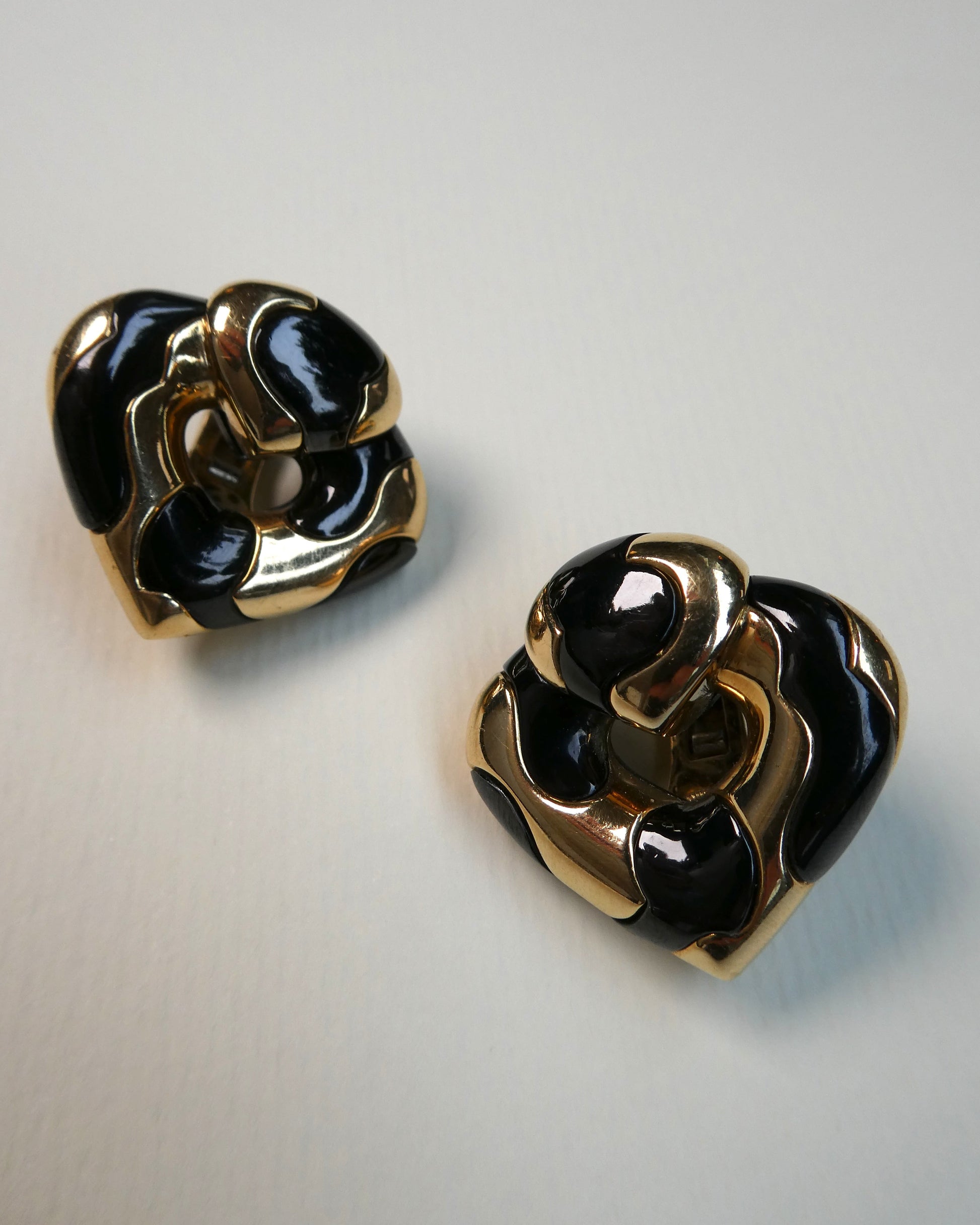 MARINA B. ‘PARDY ET PARDY’ GOLD & STEEL HEART CLIP EARRINGS, 1985