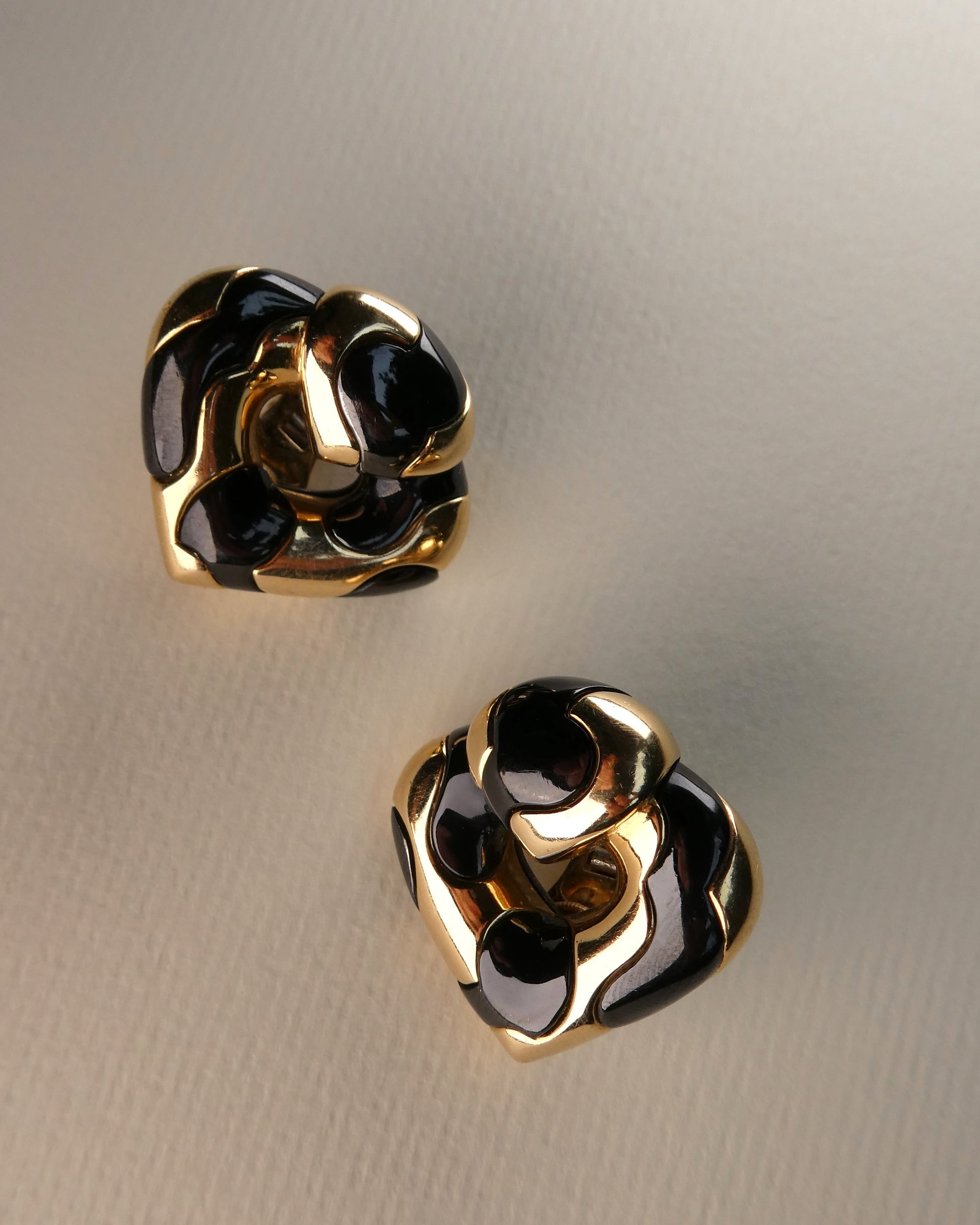 MARINA B. ‘PARDY ET PARDY’ GOLD & STEEL HEART CLIP EARRINGS, 1985