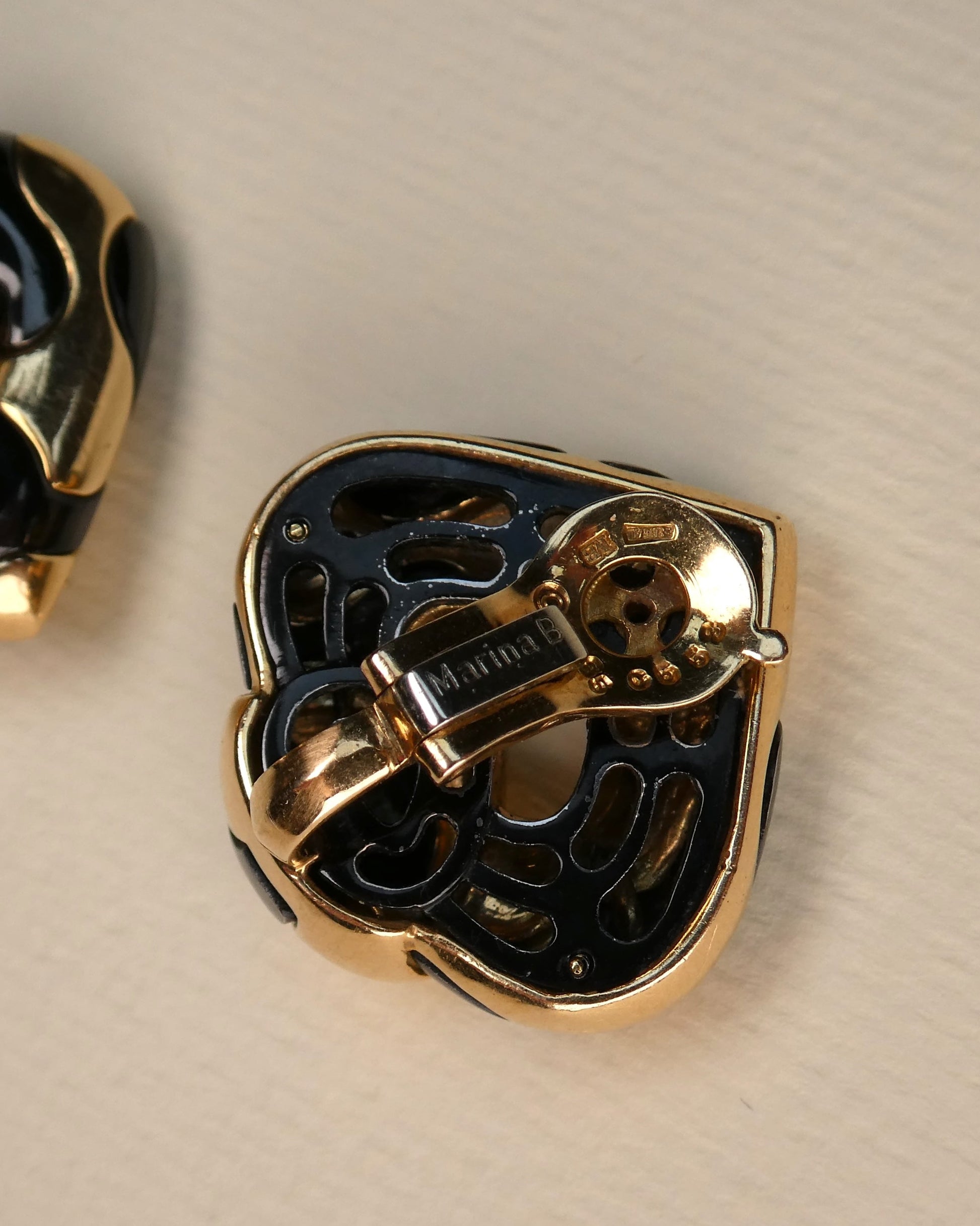 MARINA B. ‘PARDY ET PARDY’ GOLD & STEEL HEART CLIP EARRINGS, 1985