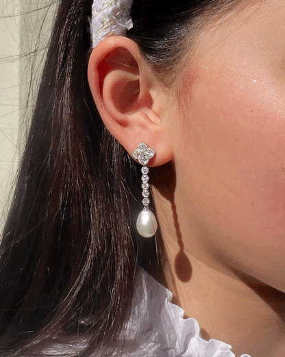 DIAMOND, NATURAL PEARL & PLATINUM EARRINGS, 1910s