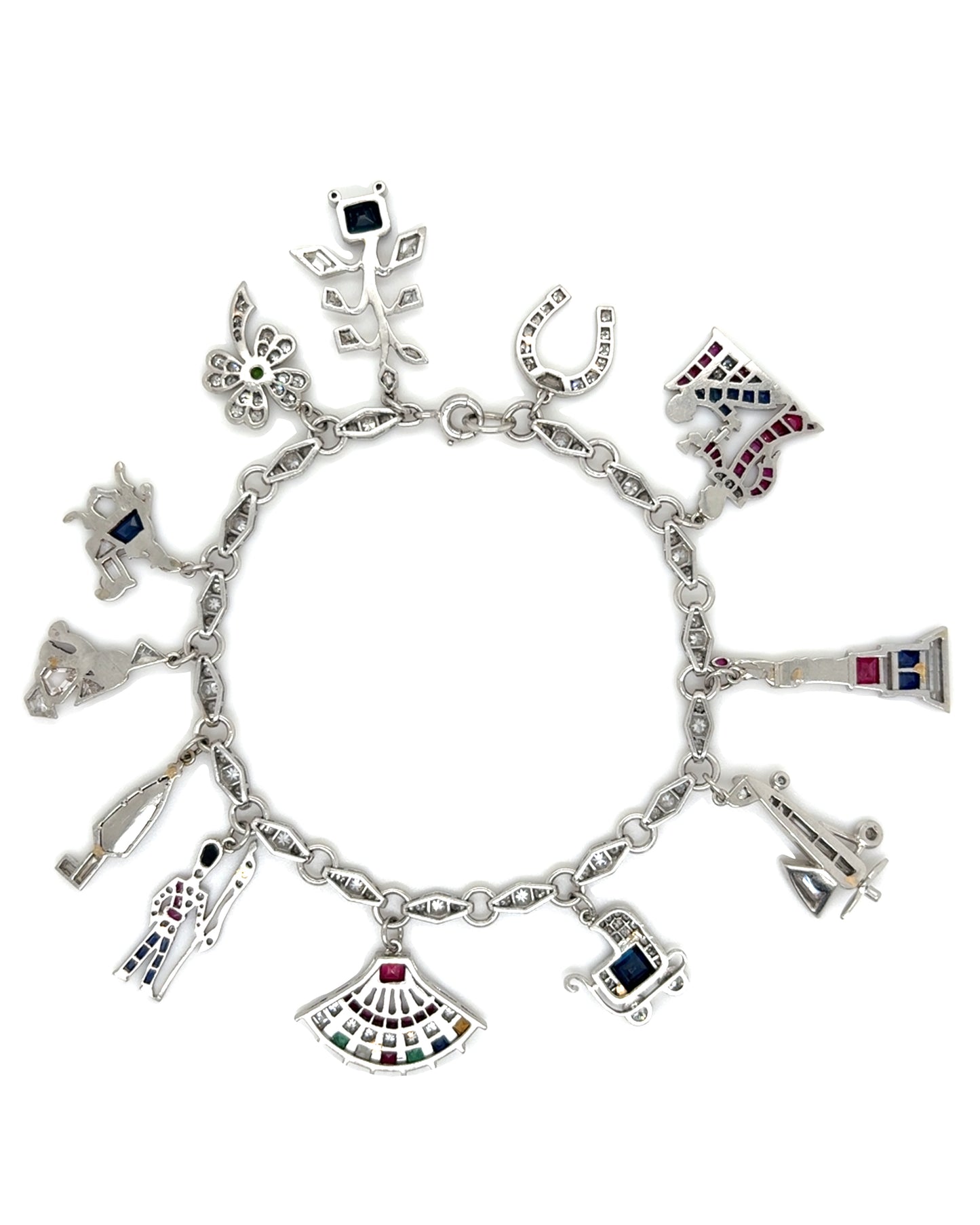 ART DÉCO DIAMOND, COLOURED GEMSTONES & PLATINUM BRACELET WITH 12 CHARMS, INCL. 1 BY CARTIER