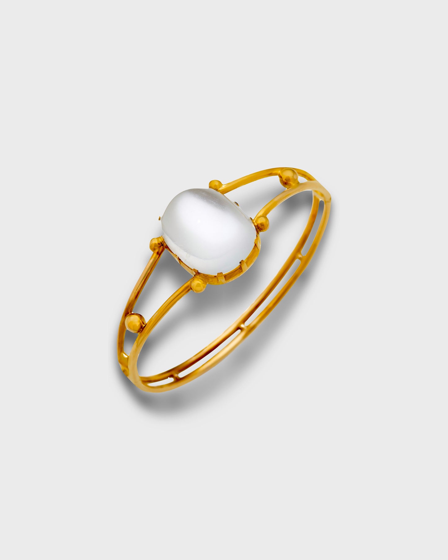 VICTORIAN MOONSTONE & 15k ROSE GOLD BANGLE, 1880s
