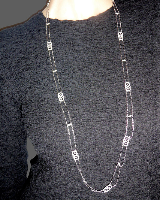 EDWARDIAN DIAMOND, NATURAL PEARL & PLATINUM SAUTOIR, 1915