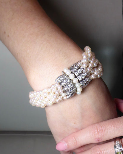 VAN CLEEF & ARPELS PEARL, DIAMOND & PLATINUM BRACELET, 1950s
