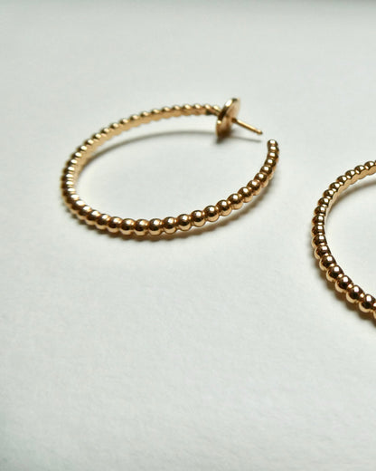 VAN CLEEF & ARPELS 'PERLÉE' YELLOW GOLD HOOP EARRINGS, 21st CENTURY