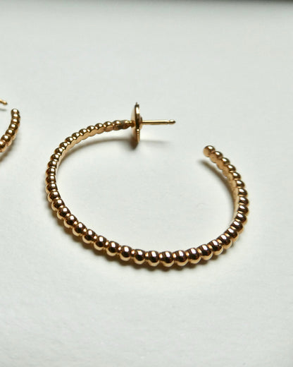 VAN CLEEF & ARPELS 'PERLÉE' YELLOW GOLD HOOP EARRINGS, 21st CENTURY