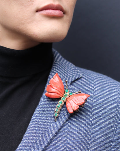A MONUMENTAL ITALIAN BUTTERFLY BROOCH with eight cabochon emeralds and diamonds over coral