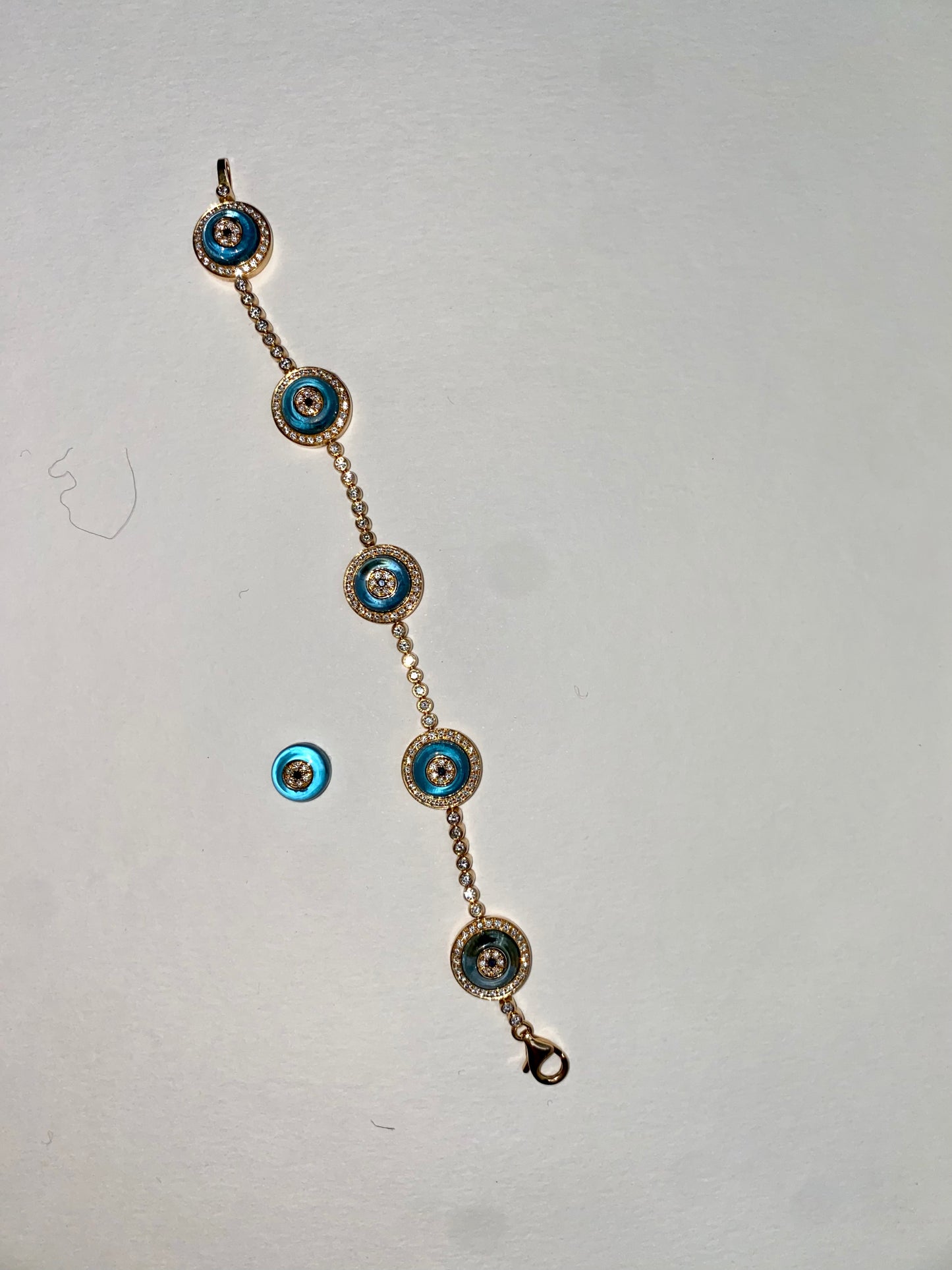LORRAINE SCHWARTZ 'AGAINST EVIL EYE FIVE EYE' ROSE GOLD, DIAMOND & TOPAZ BRACELET, 21st CENTURY