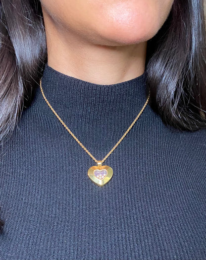 CHOPARD 'FLOATING DIAMONDS' YELLOW GOLD HEART PENDANT NECKLACE, 2010s