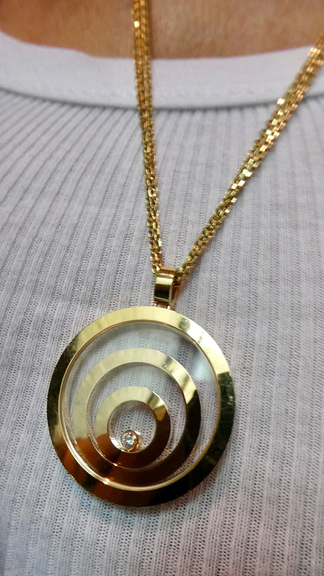 CHOPARD 'HAPPY SPIRIT' YELLOW GOLD & DIAMOND PENDANT NECKLACE, 2010s