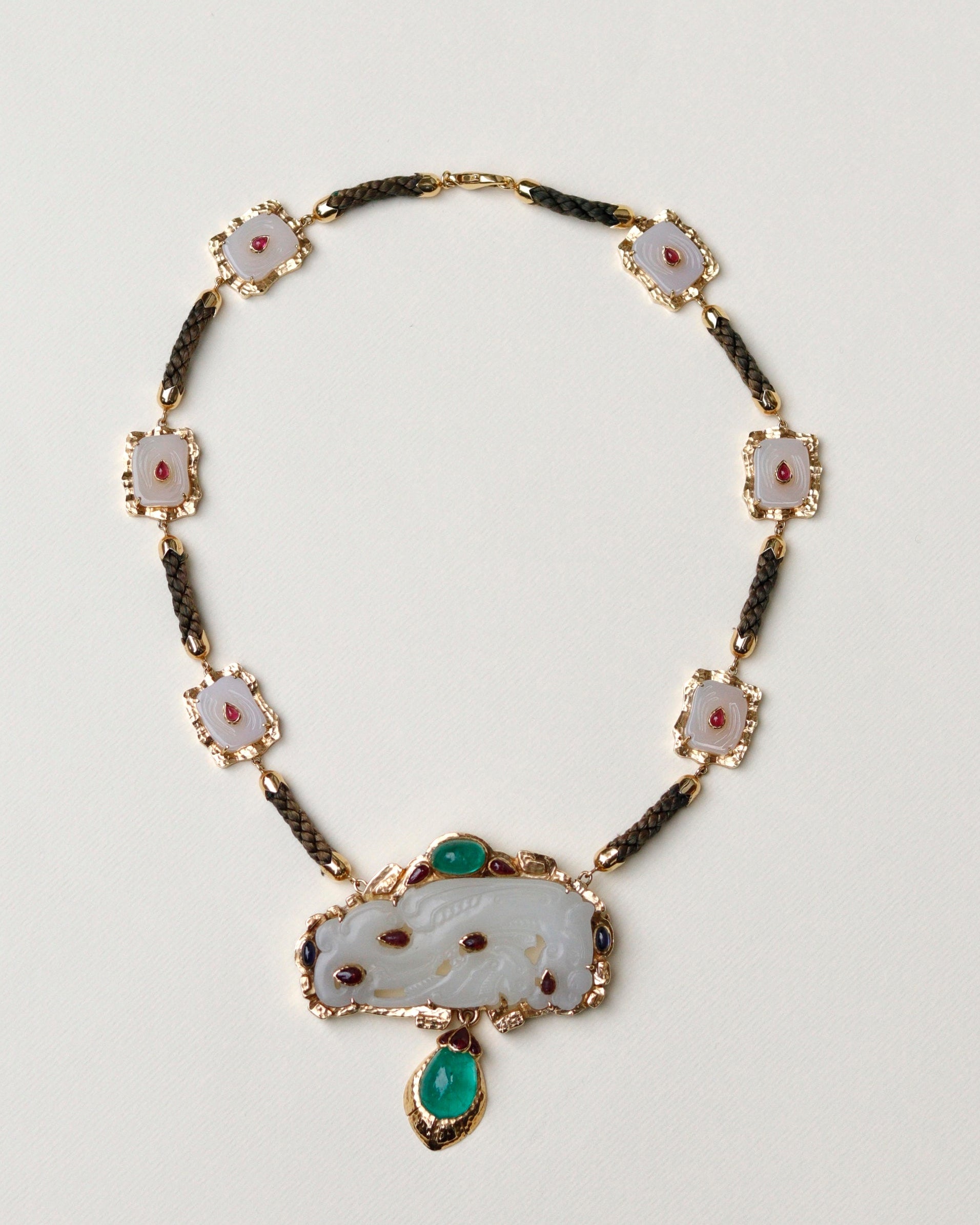 "BRAND & PERIOD: DAVID WEBB

MATERIALS: GOLD, JADE, EMERALD AND RUBY

SIZE / DIMENSIONS: Necklace length: 30cm. Stone: width: 8.5cm. Please contact us for confirmed measurements.

WEIGHT: 115.65gr 

CONDITION: Excellent

JWL AUTHENTICITY GUARANTEE