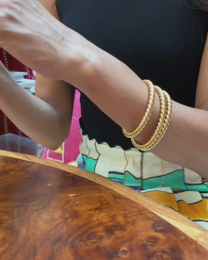 THREE VAN CLEEF & ARPELS YELLOW GOLD BRACELETS