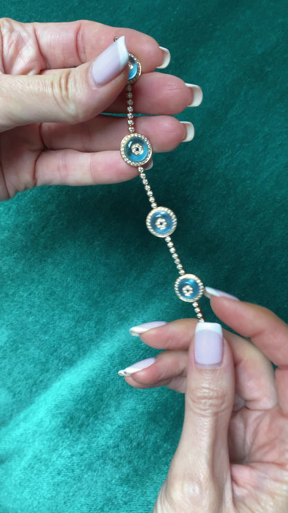 LORRAINE SCHWARTZ 'AGAINST EVIL EYE FIVE EYE' ROSE GOLD, DIAMOND & TOPAZ BRACELET, 21st CENTURY