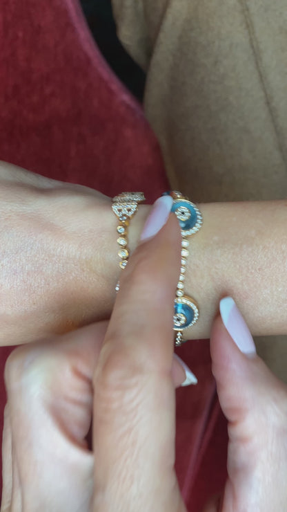 LORRAINE SCHWARTZ 'AGAINST EVIL EYE FIVE EYE' ROSE GOLD, DIAMOND & TOPAZ BRACELET, 21st CENTURY