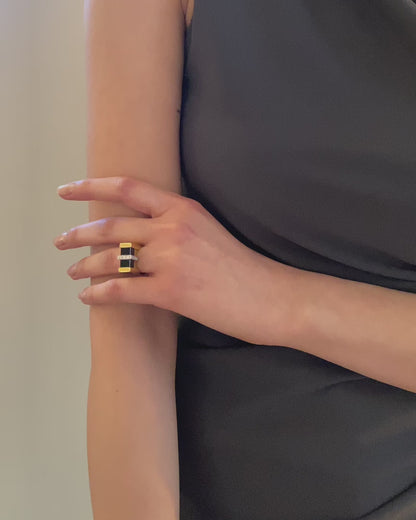 ONYX, DIAMONDS, YELLOW & WHITE GOLD RING, 1970s