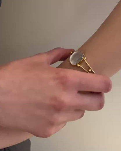 VICTORIAN MOONSTONE & 15k ROSE GOLD BANGLE, 1880s