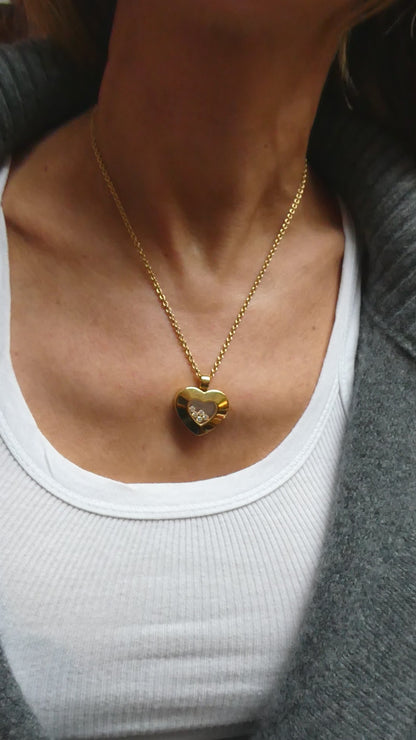 CHOPARD 'FLOATING DIAMONDS' YELLOW GOLD HEART PENDANT NECKLACE, 2010s
