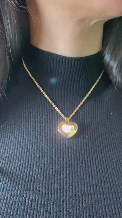 CHOPARD 'FLOATING DIAMONDS' YELLOW GOLD HEART PENDANT NECKLACE, 2010s